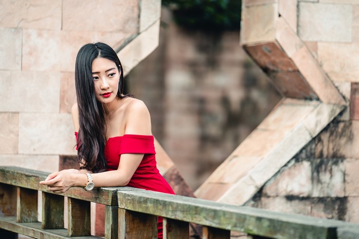 Brunette girl in red dress