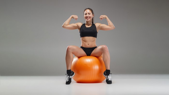 4K Fitness Woman Sitting on Ball
