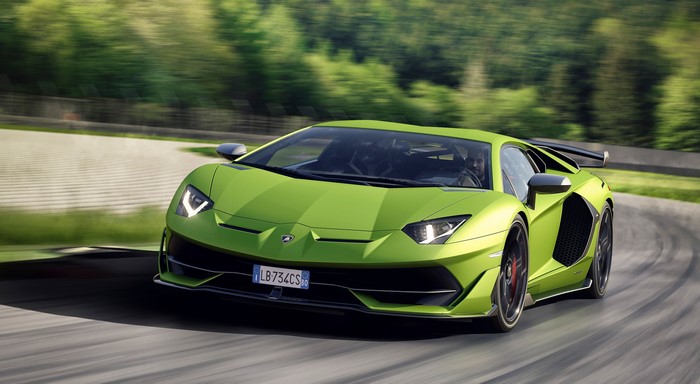 Green Lamborghini Aventador SVJ on a Racetrack