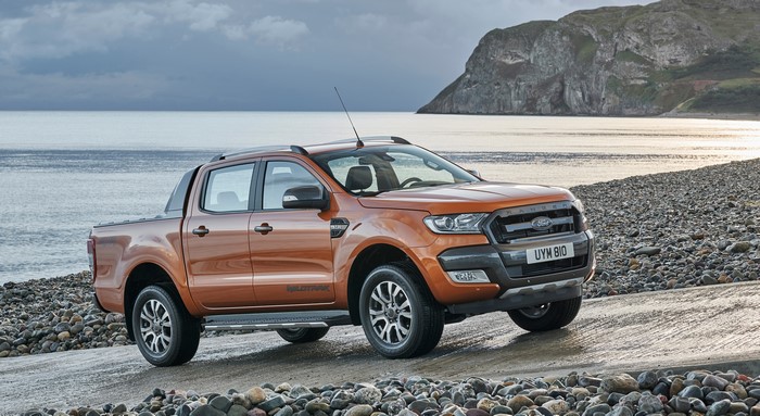 Ford Ranger Wildtrak pickup truck on a rocky beach