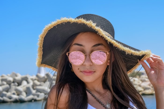 Girl with Hat and Pink Sunglasses
