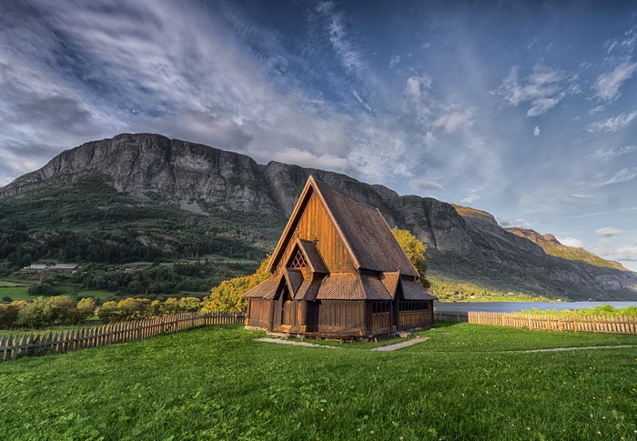 Wooden Church in Valdres, Norway with Mountains