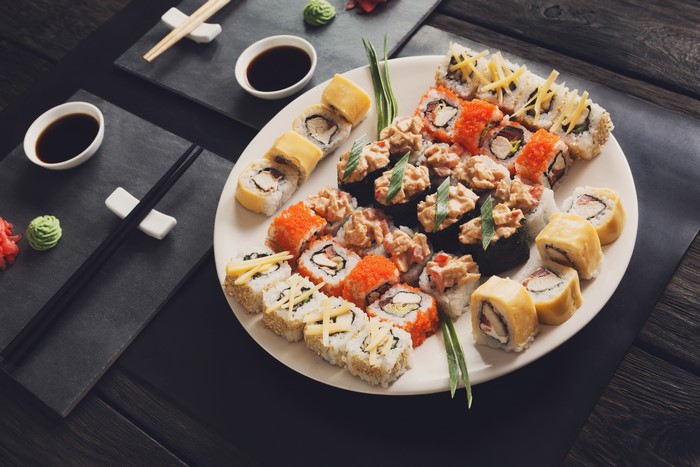 Sushi plate with chopsticks and soy sauce