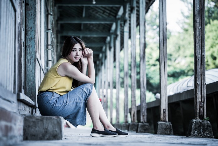 4K Asian Woman Sitting in Denim Skirt