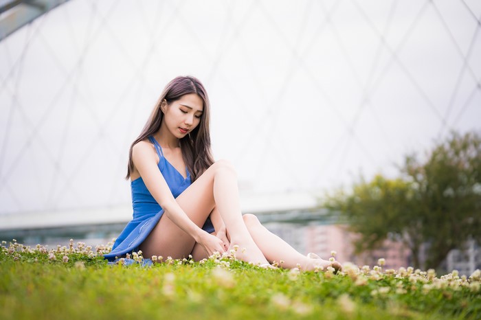 4K Asian Woman Sitting in Blue Dress