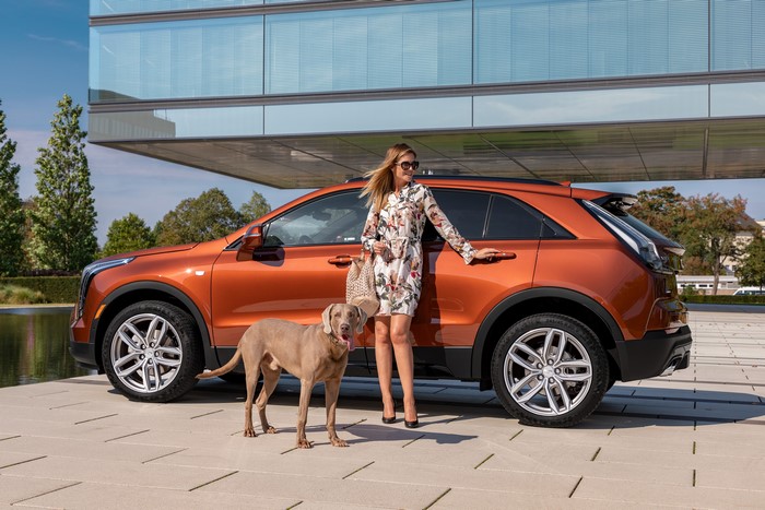 Cadillac XT4 Crossover with Woman and Dog
