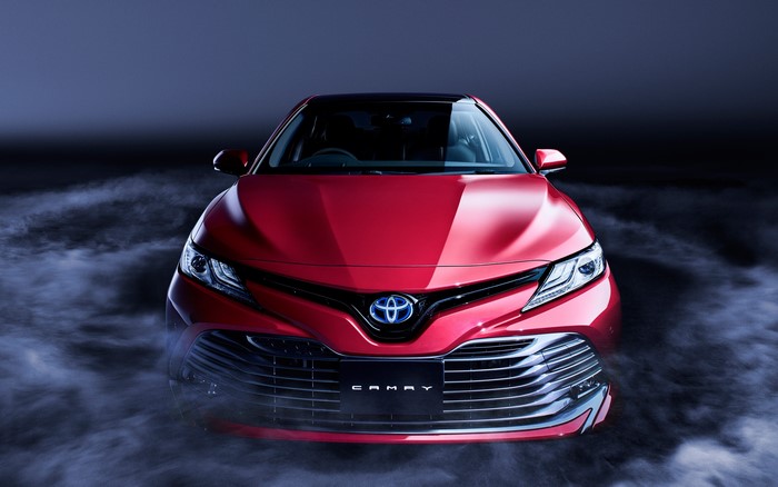 Red Toyota Camry Hybrid Front View