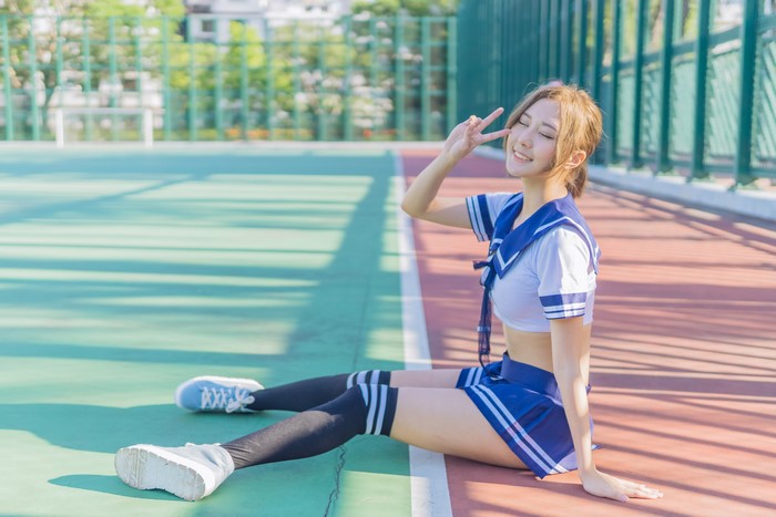 4K Asian Schoolgirl in Blue Uniform Sitting