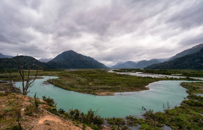Patagonia, Chile: Mountains and Rivers Under Cloudy Sky