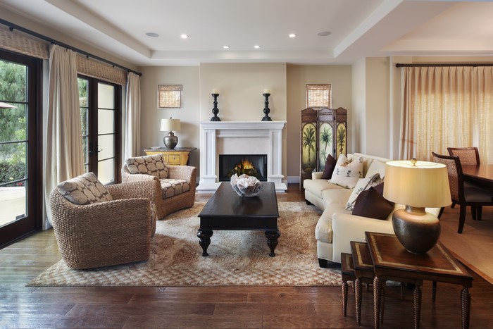 Living room with fireplace and armchairs