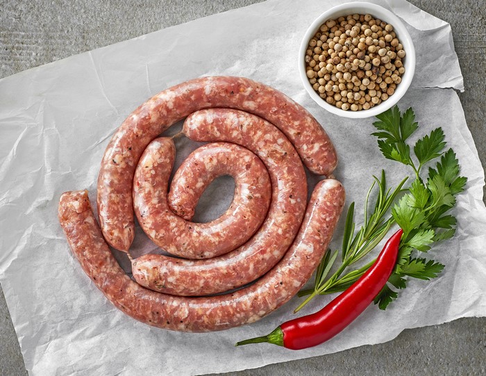Raw Sausage Coil with Spices and Chili Pepper