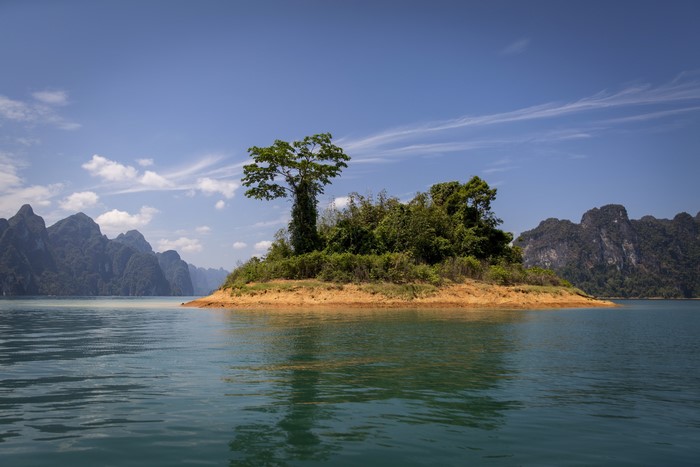 Island with trees on Cheow Lan Lake, Thailand