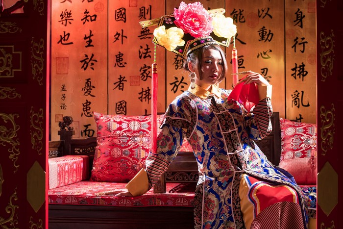 Woman in Traditional Chinese Attire with Elaborate Headdress