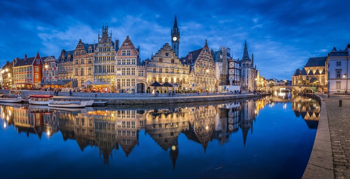 Ghent Waterfront with Leie River and Houses at Dusk