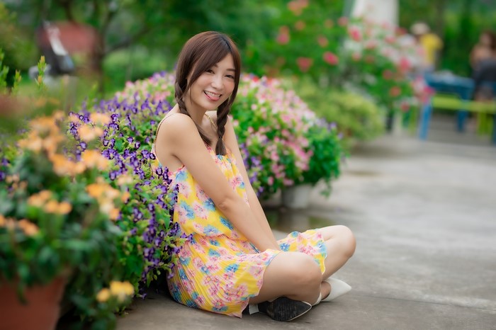 4K Asian Woman Sitting with Braid and Smile