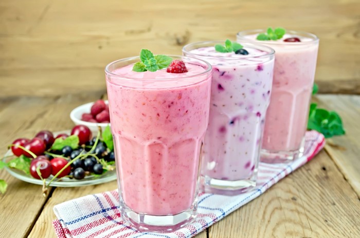 Three Berry Smoothies with Fresh Berries and Mint