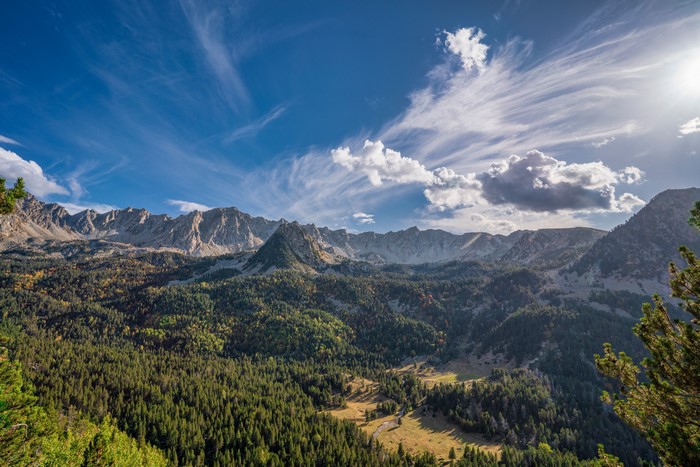Pyrenees Mountains in Andorra with Forest and Clouds