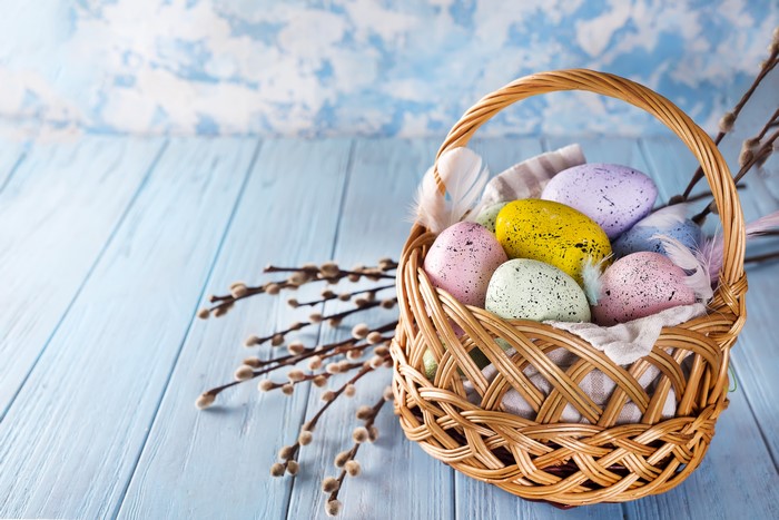 Easter Eggs in a Wicker Basket with Pussy Willows