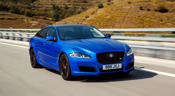 Blue 2017 Jaguar XJR575 Sedan on a Road