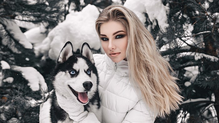 Anastasia Fogler with a Husky in the Snow