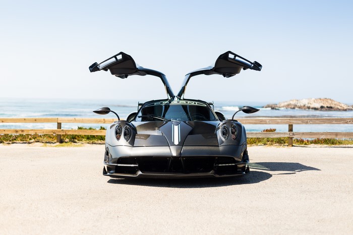 Pagani Huayra with opened doors by the ocean