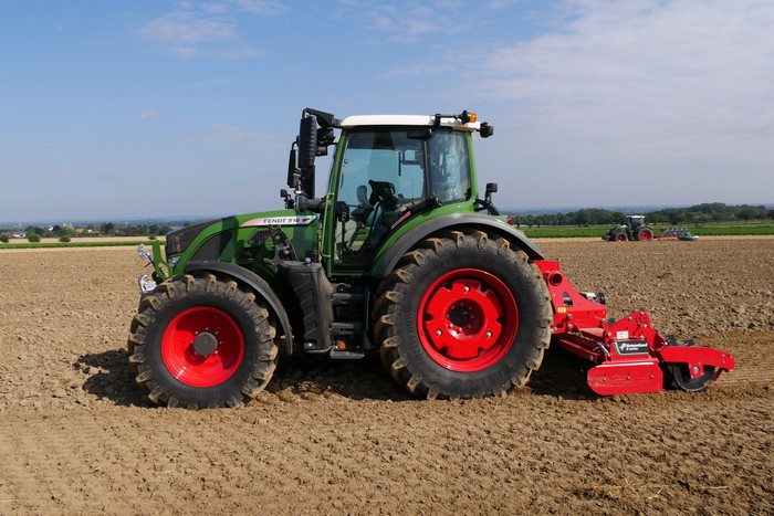 Fendt 516 Vario tractor plowing a field