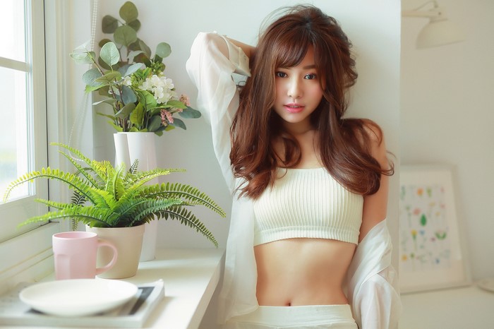 Asian Woman with Brown Hair and Casual Outfit