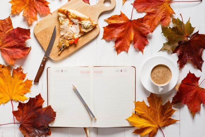 Autumn Flat Lay with Pizza, Coffee, and Journal