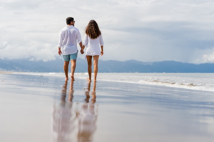 Couple walking on a beach