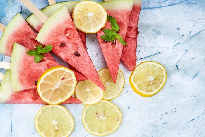 Watermelon slices and lemon slices with mint