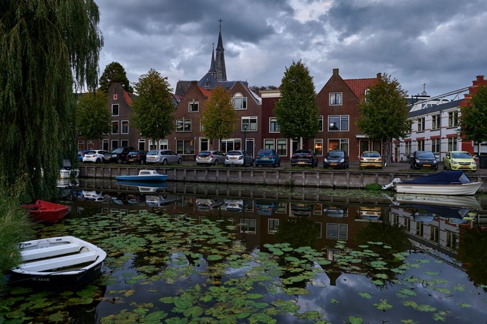 Canal in Monnickendam, Netherlands with Houses and Boats
