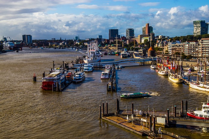 Hamburg Harbor with Sailboats and City Skyline