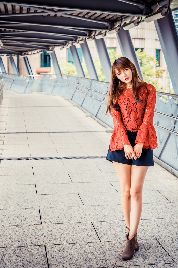Asian Woman in Red Lace Blouse and Skirt