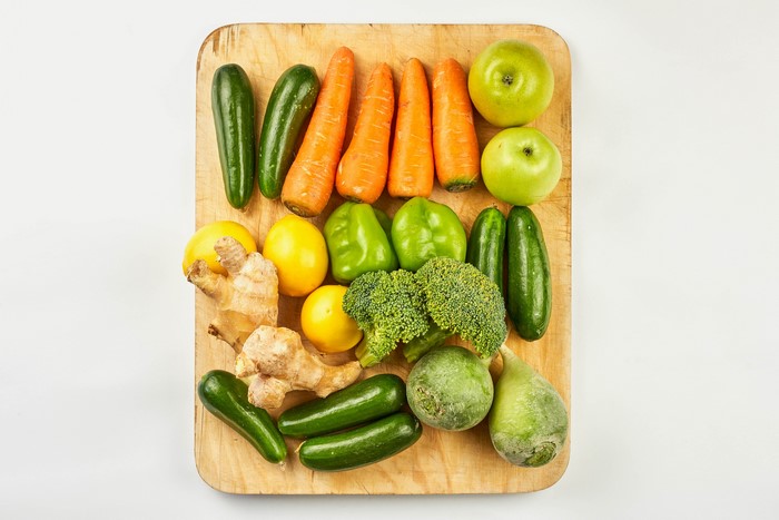 Vegetables and fruits on a cutting board