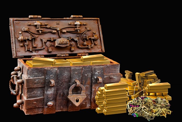 Treasure chest filled with gold ingots and jewelry