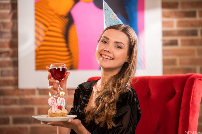 Polina Kadynskaya with cake and wine