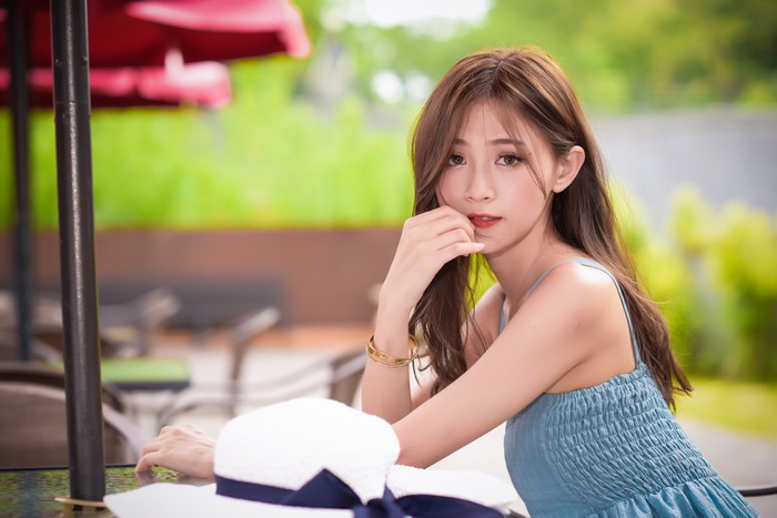 4K Asian Woman with Brown Hair and Bokeh Effect