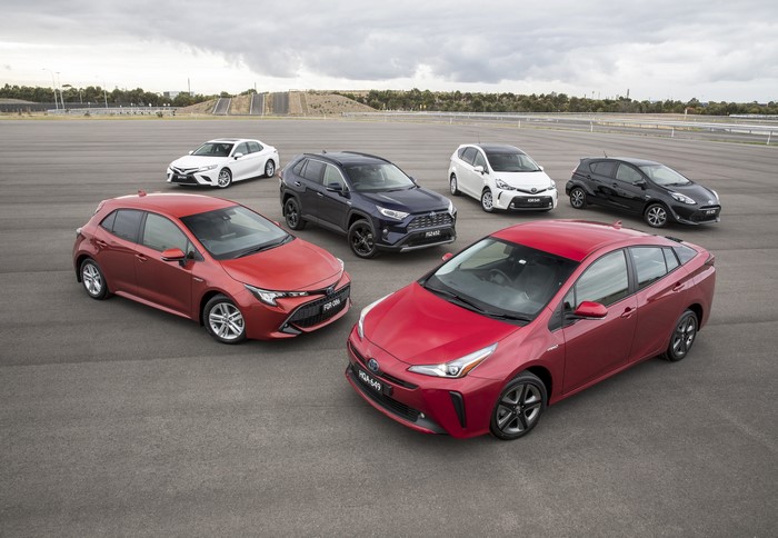 Toyota cars parked on asphalt lot