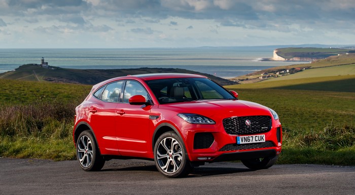 Red Jaguar E-Pace R-Dynamic First Edition parked by the sea