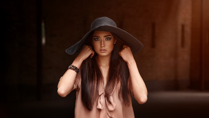 Model Viacheslav Krivonos wearing a hat