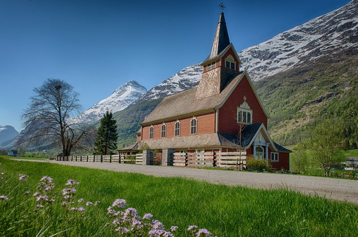 Church in Olden, Norway with Mountains