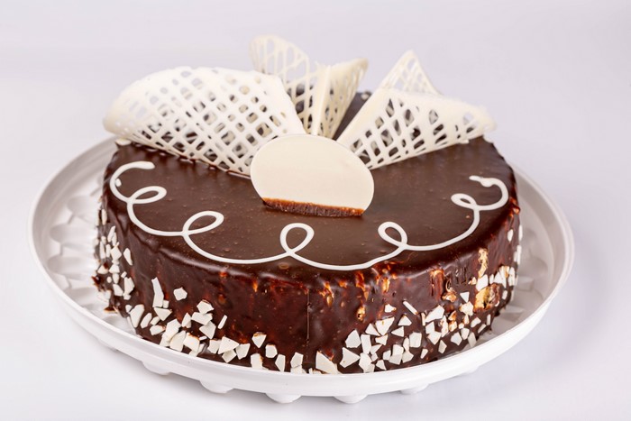 Chocolate cake with white chocolate decorations