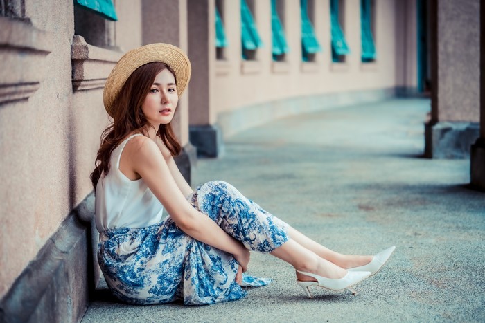 4K Asian Woman Sitting in Floral Skirt