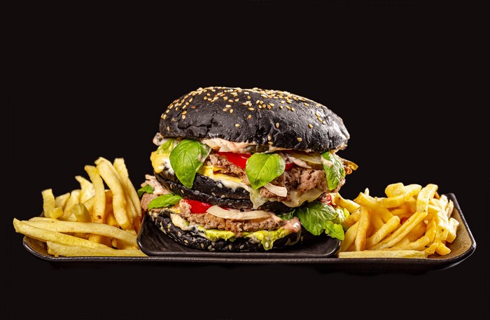 Double black hamburger with french fries