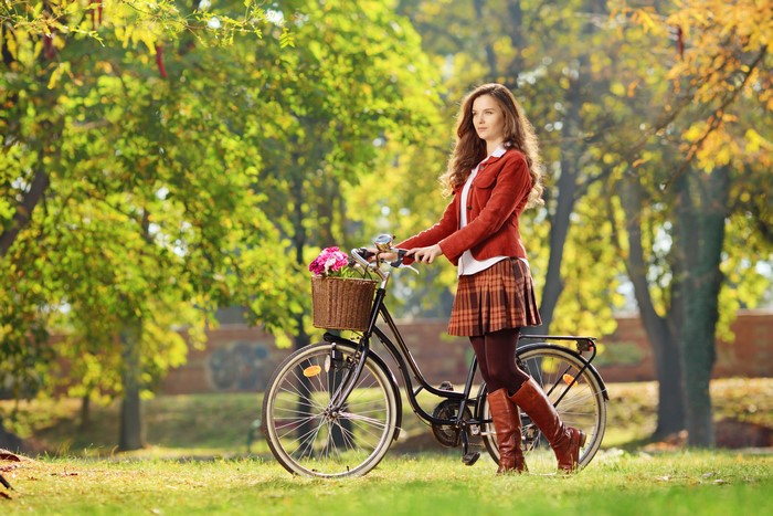 4K Autumn Scene Woman with Bicycle