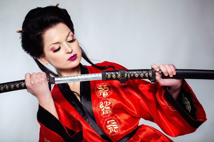 Woman in Kimono Holding Katana