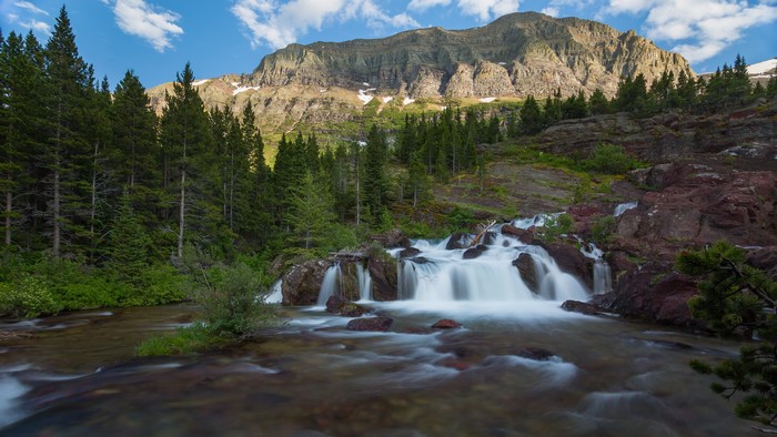 Glacier National Park Waterfall with Mountains