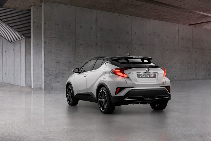 White Toyota C-HR Hybrid GR Sport Crossover from behind