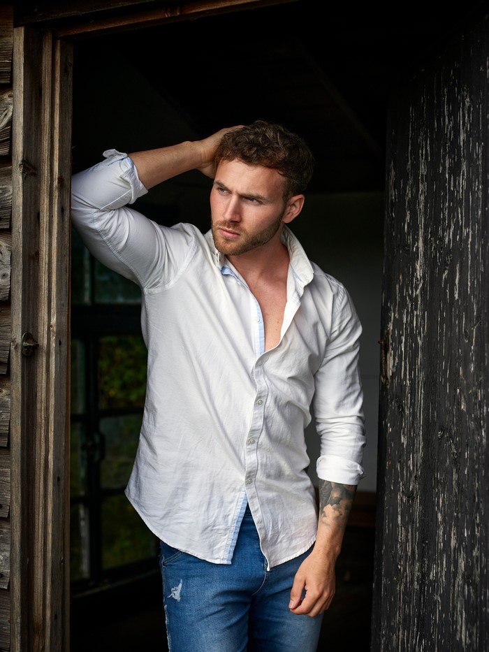 Man in White Formal Shirt Posing