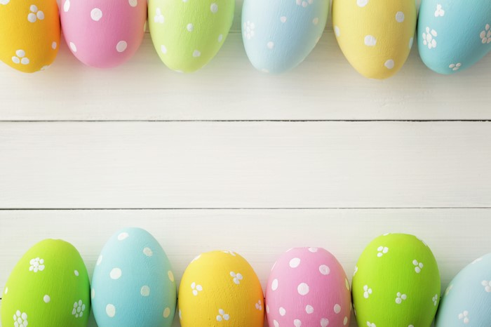 Easter Eggs on White Wooden Background